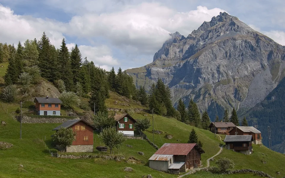 Mountain village beneath the peaks in the Arnisee region of Switzerland